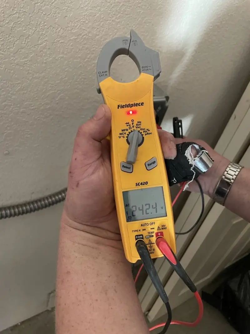 Voltage testing with clamp meter during Hot Tub / Pool Electrical Wiring in Galion